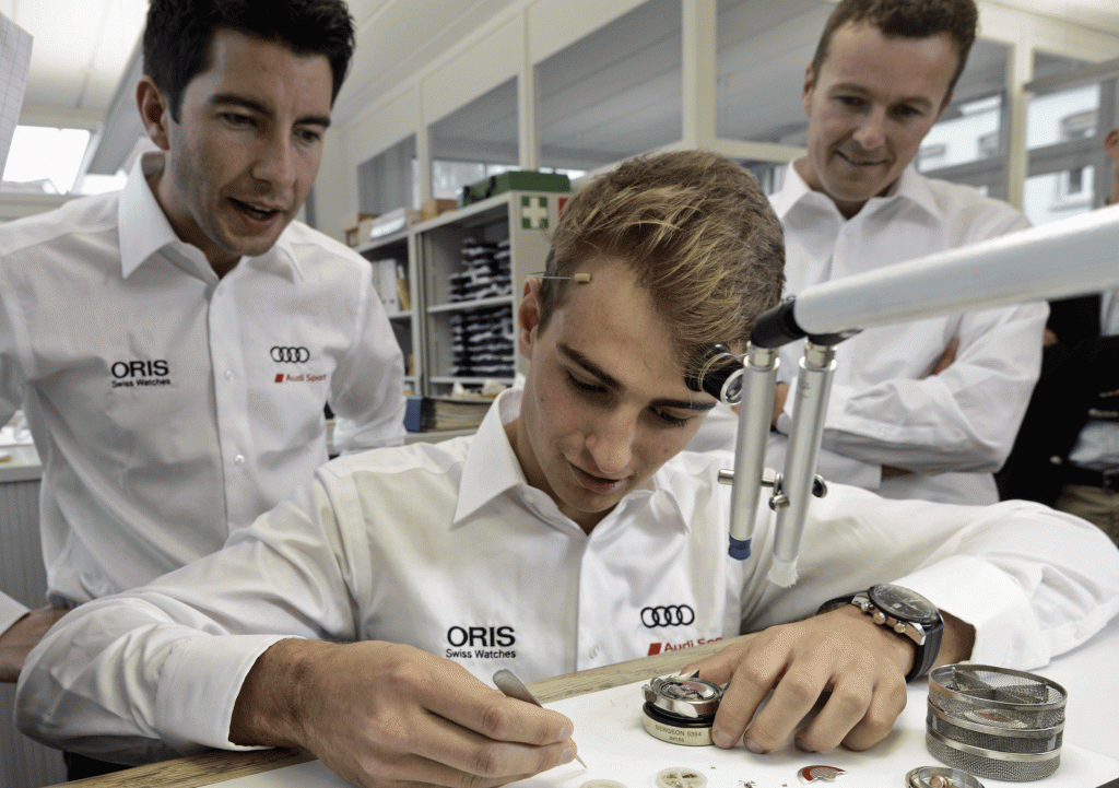 Audi - Oris.Nico Müller à l'établi sous les yeux de Mike Rockenfeller et Marcel Fässler